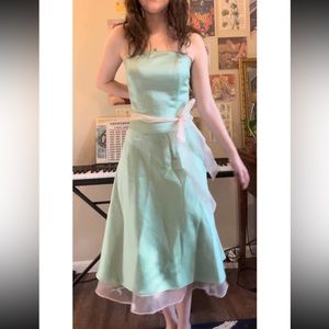 green silky 50s style strapless dress